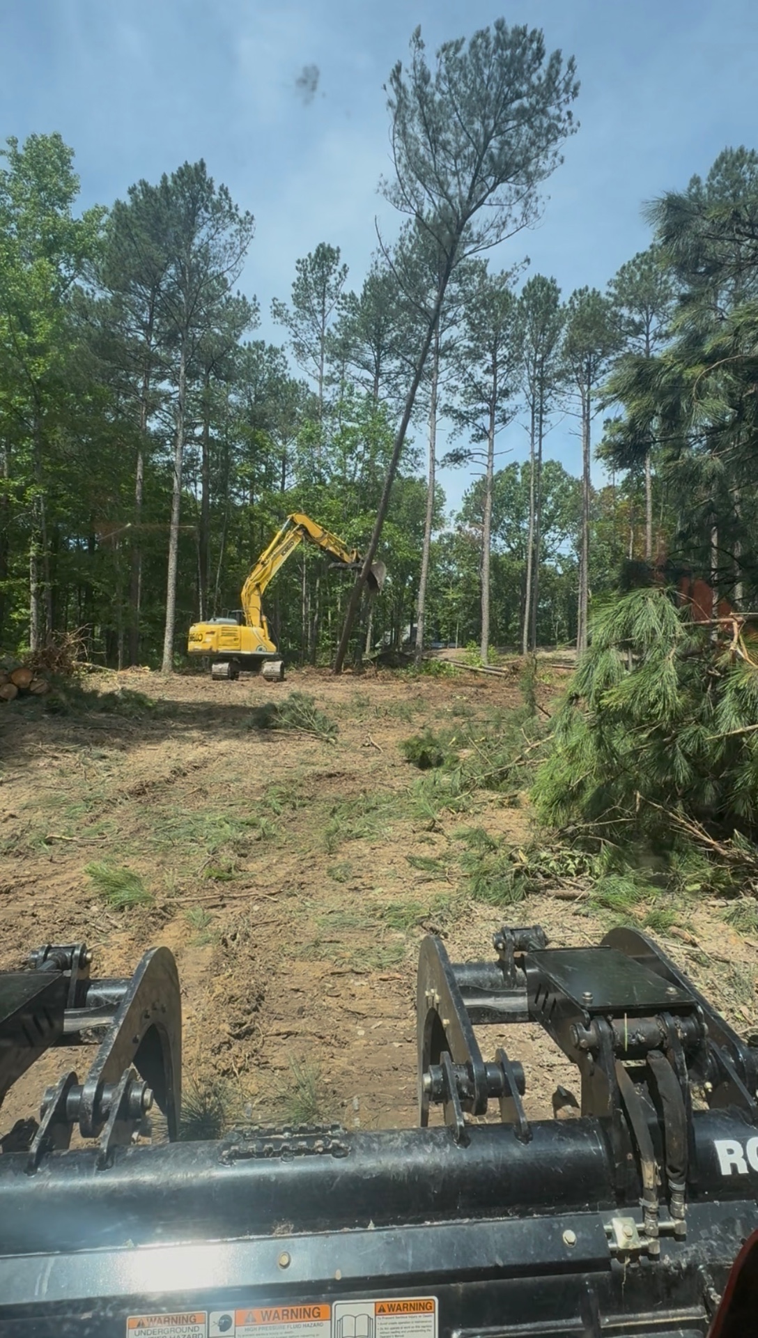 Land Clearing equipment clearing brush and vegetation